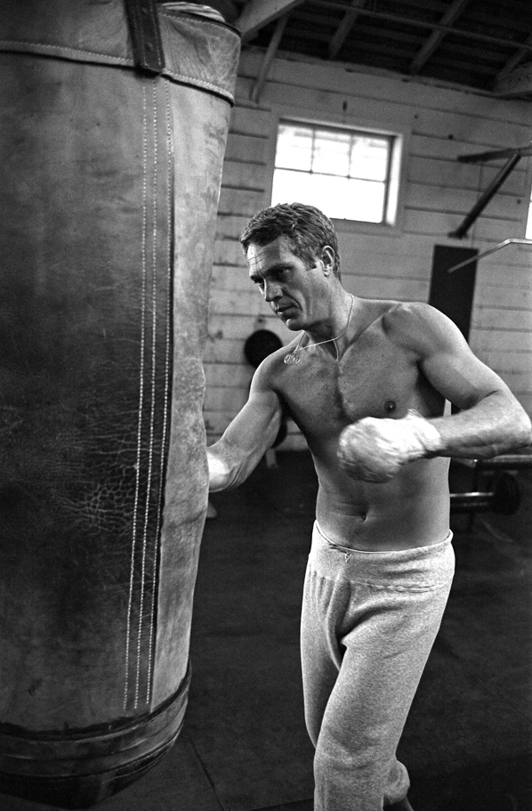 Steve McQueen boxing punching bag